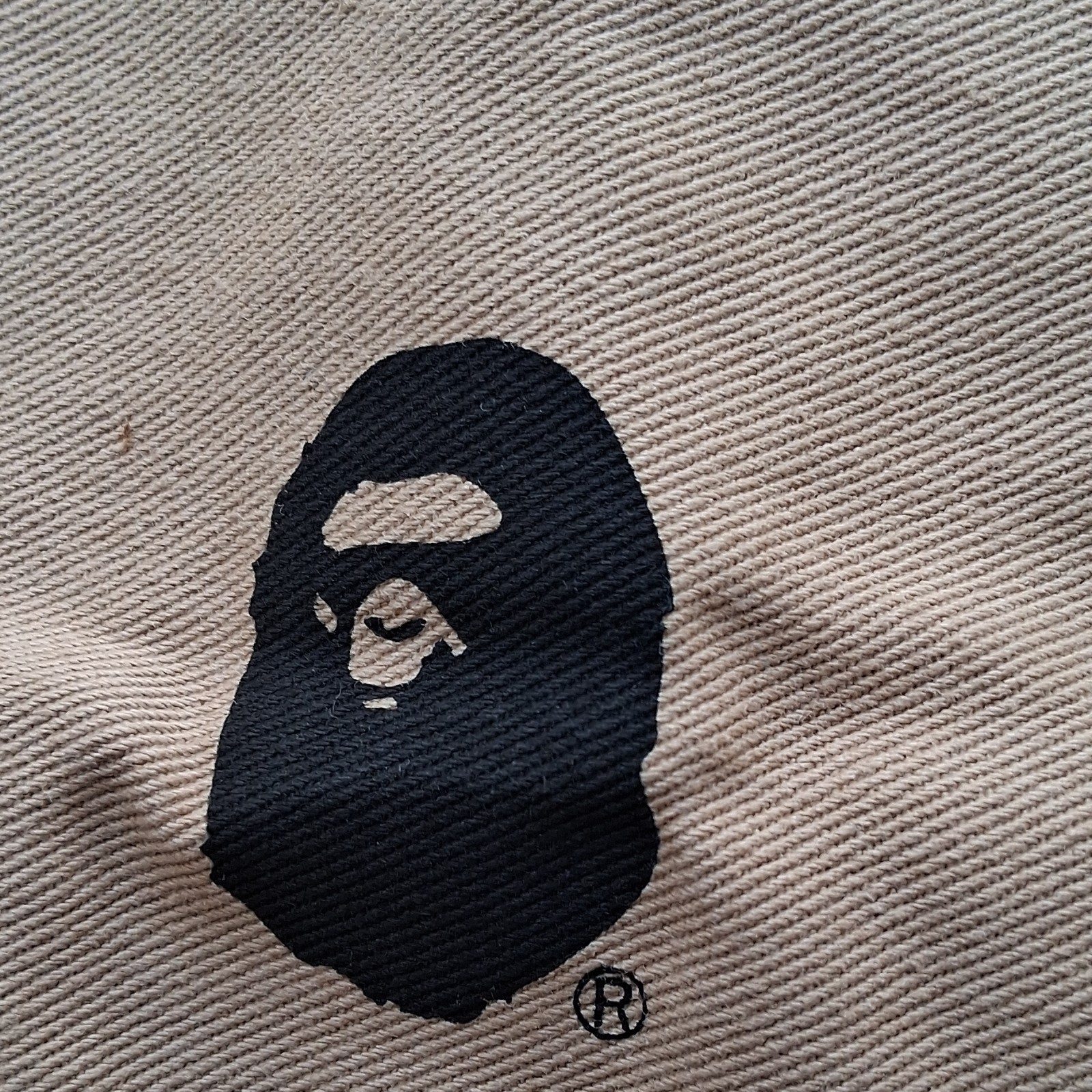 A Bathing Ape BAPE Beige & Black Ape Head Logo Solid Drawstring Bag