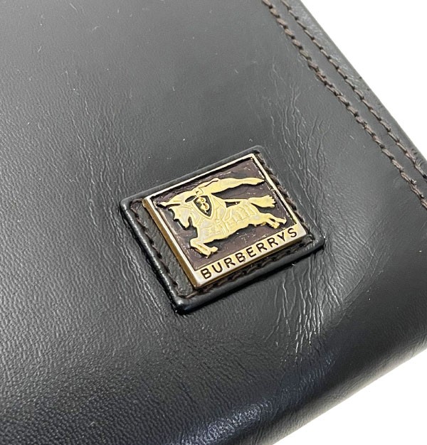 ■Authentic Burberry briefcase in black leather with a slide handle. Perfect for
