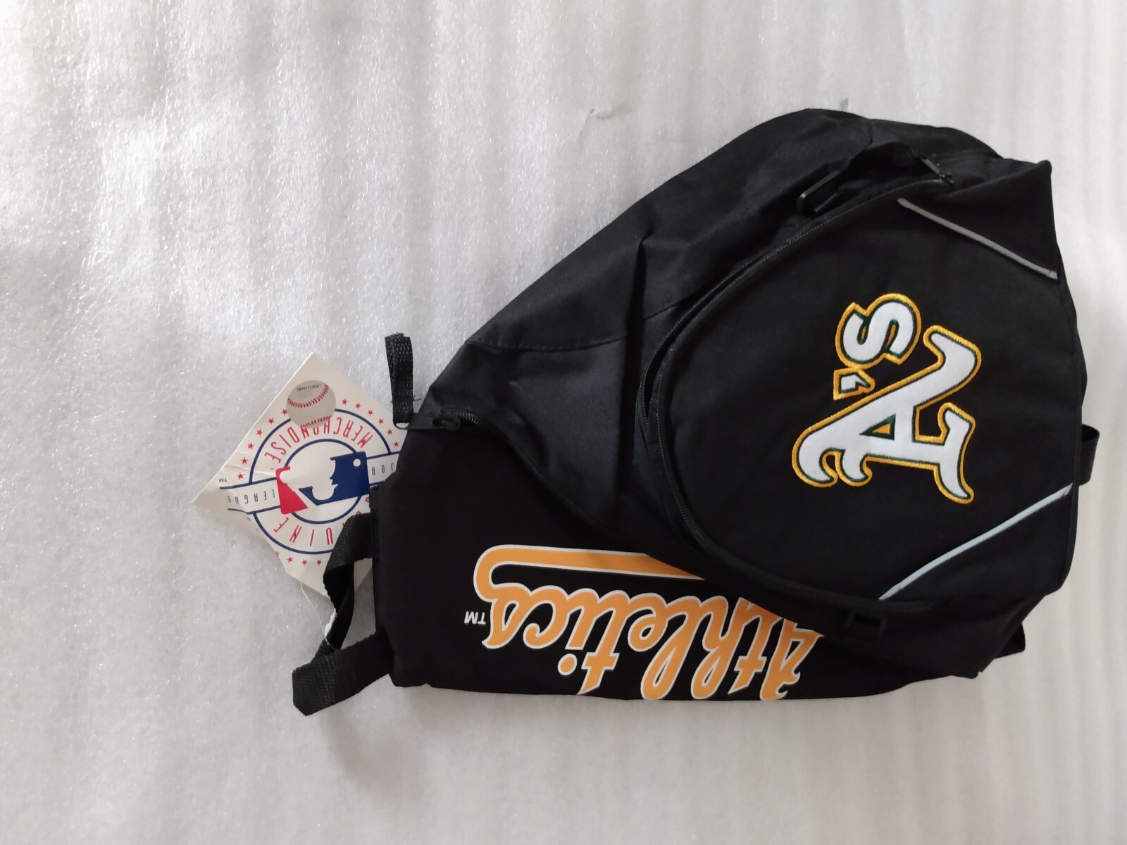 A’s baseball team black backpack 40L with white and gold lettering padded straps