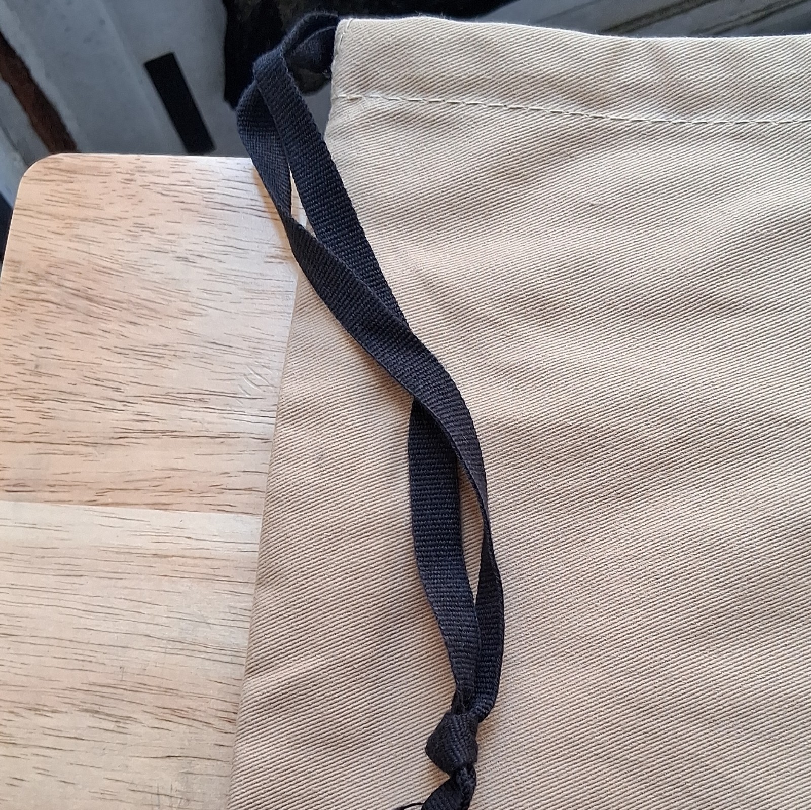 A Bathing Ape BAPE Beige & Black Ape Head Logo Solid Drawstring Bag