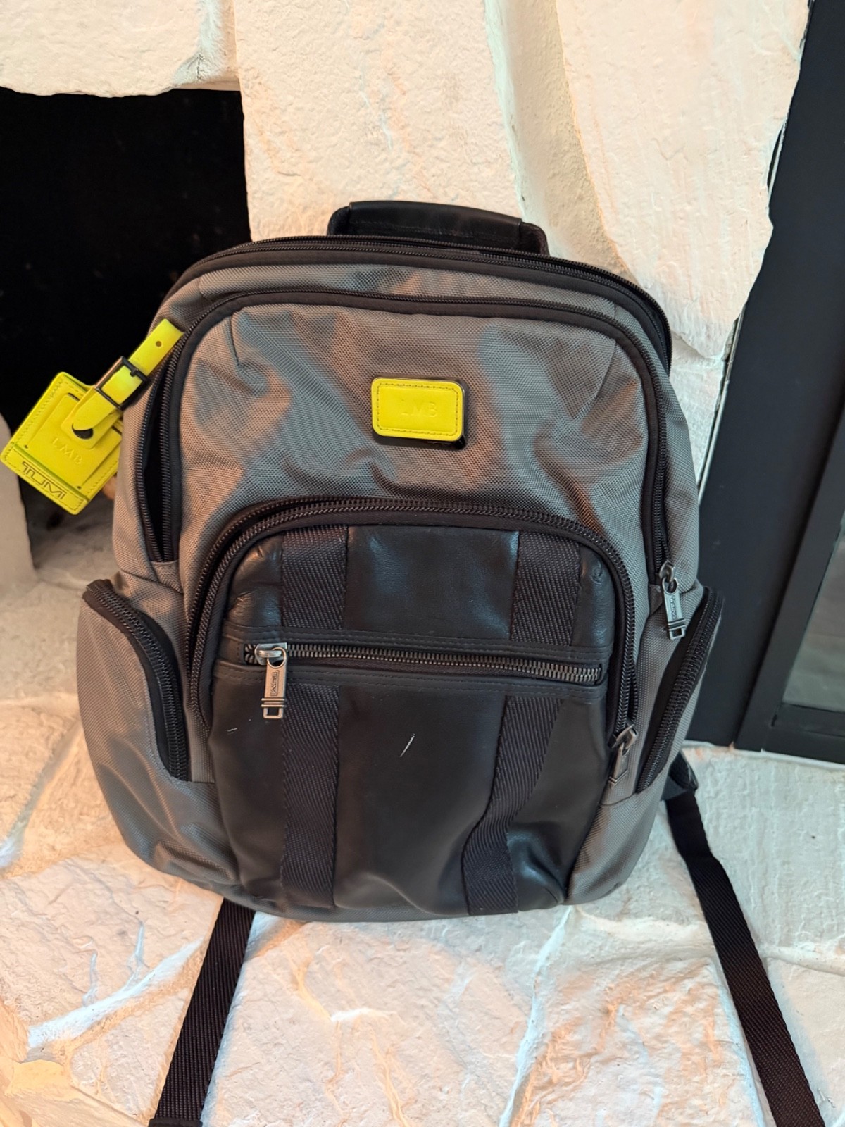 tumi backpack gray and black – has a couple of marks shown in pictures