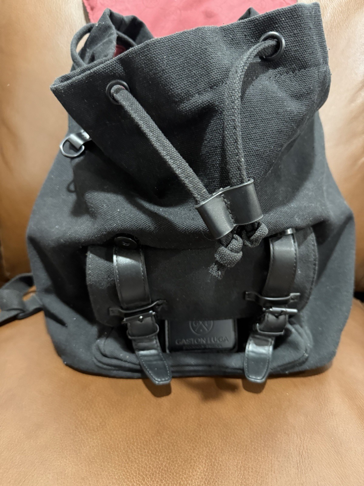 Gaston Luga Black Backpack Drawstring/Buckle Closure Adjustable Pockets Unisex