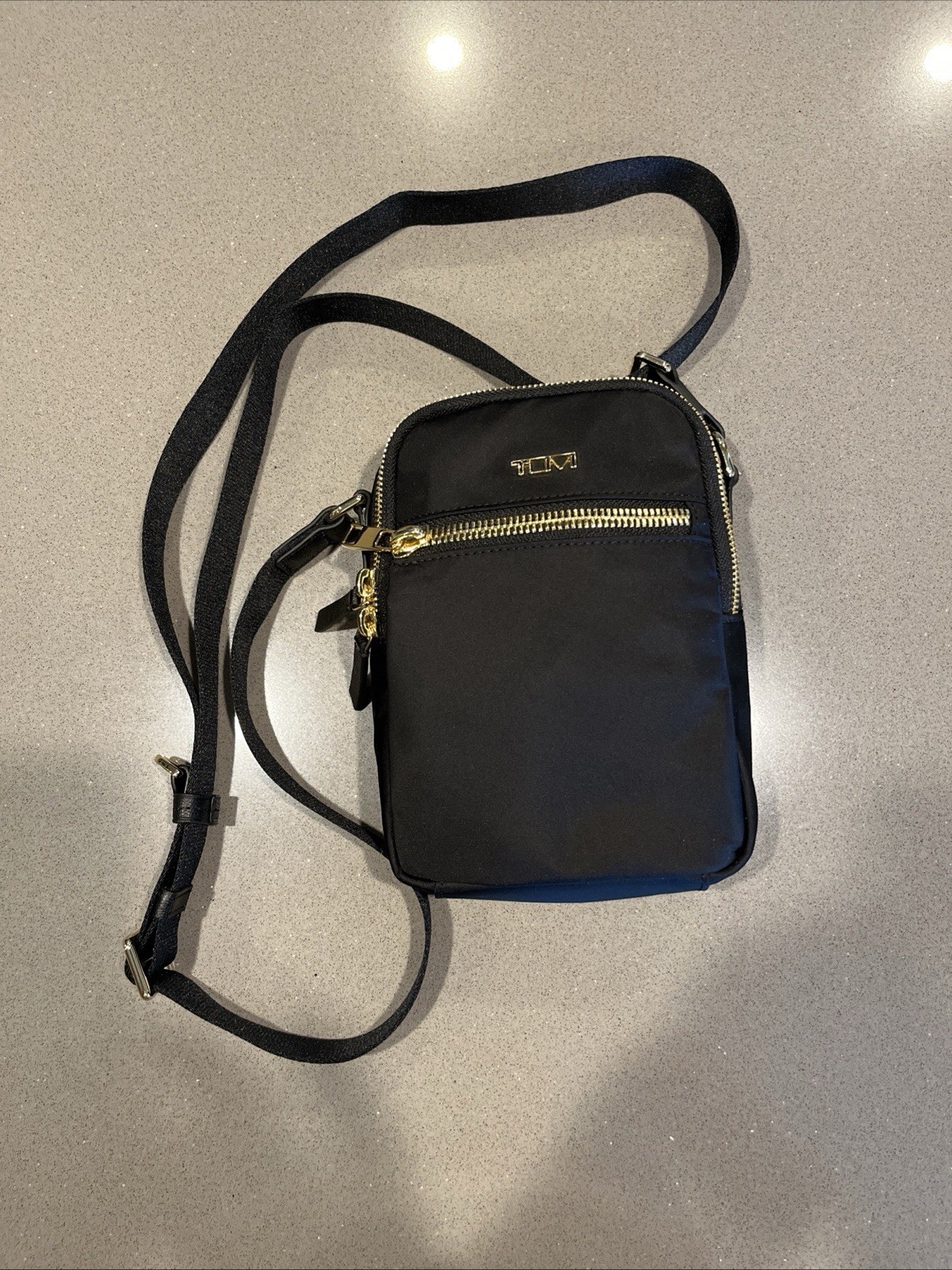 TUMI Black Small Crossbody Bag Adjustable Strap Zip Closure Pockets