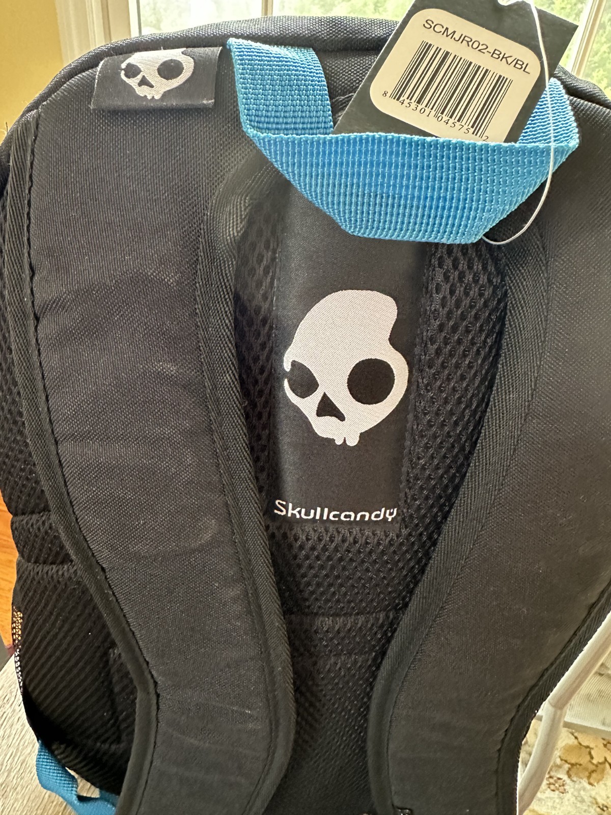 Skullcandy Backpack Blue And Black And Writing On back
