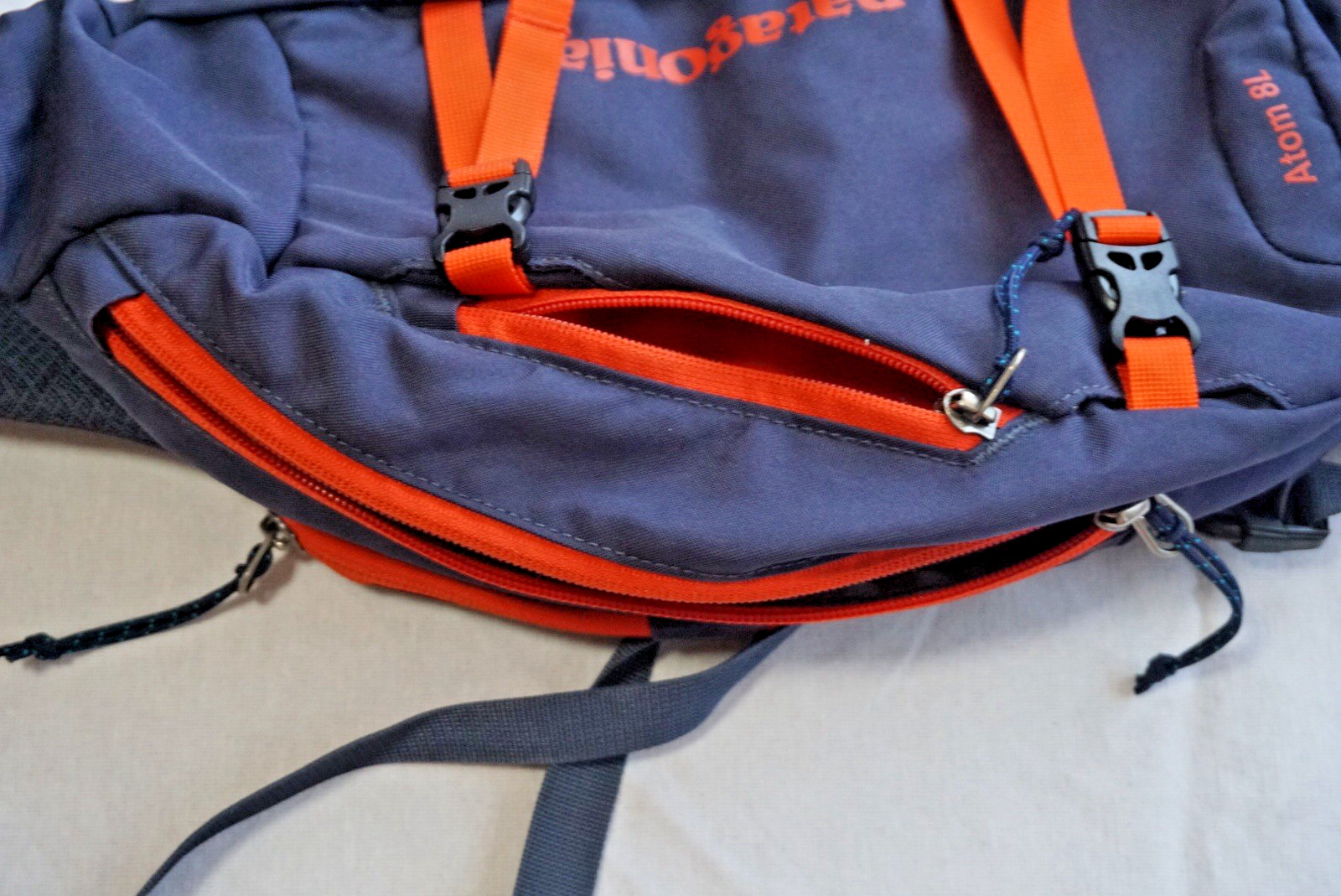 Patagonia Atom Sling 8L Backpack Crossbody Daypack Navy Orange Hiking Travel