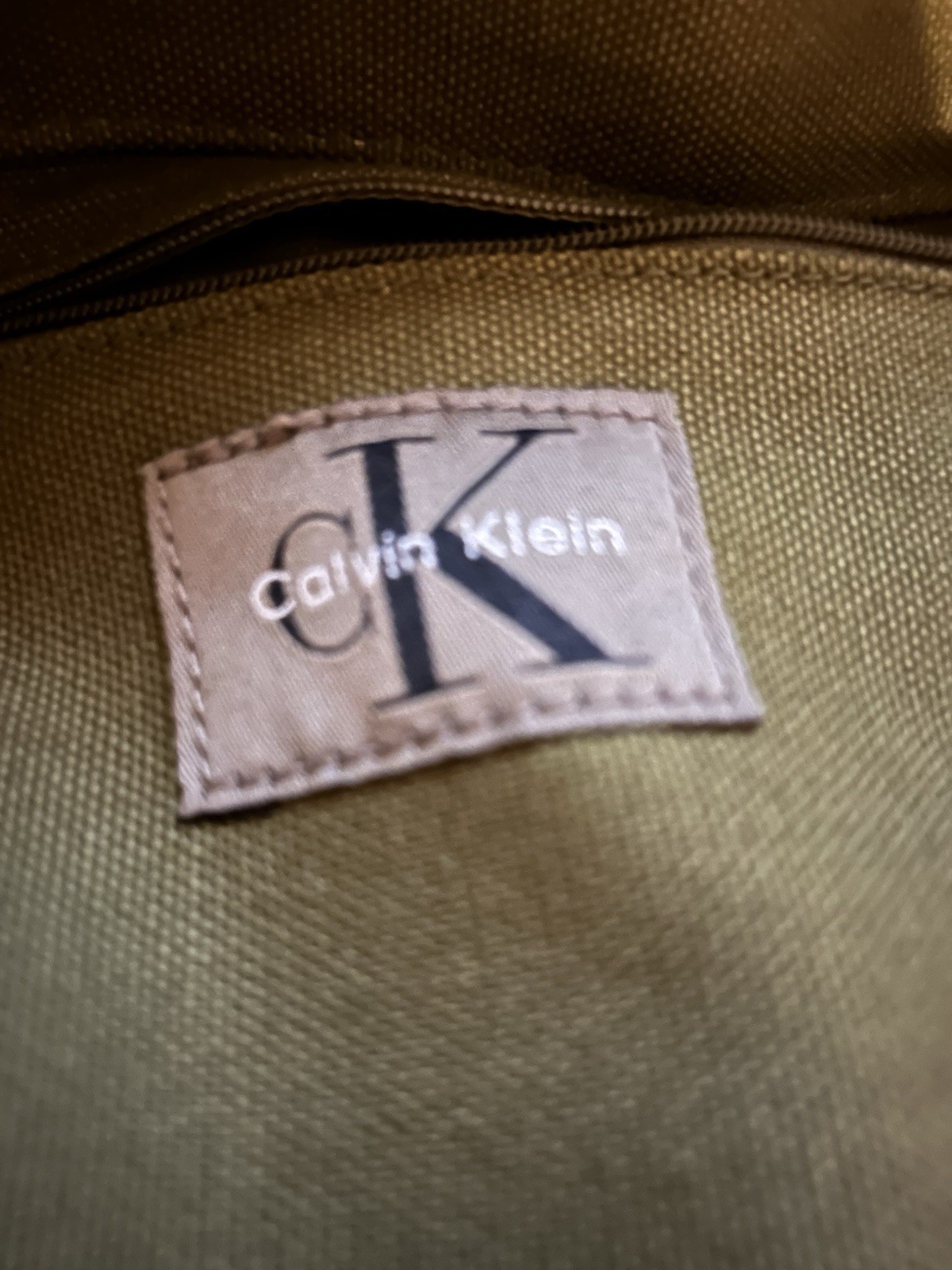 Calvin Klein Green Backpack Drawstring Buckle Zip Pockets Brown Accents