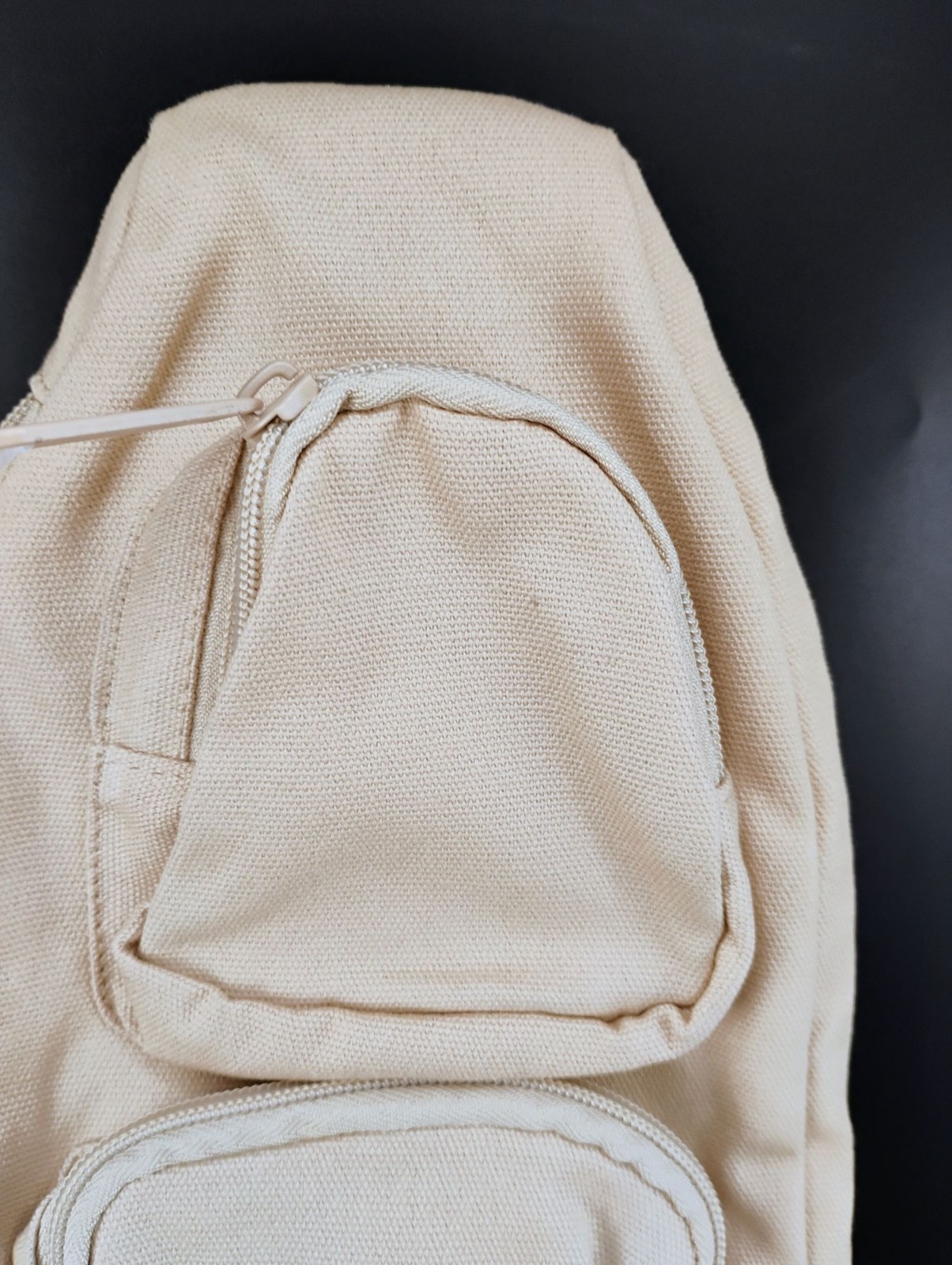Champion Beige Canvas Sling Backpack Reversible Strap Durable