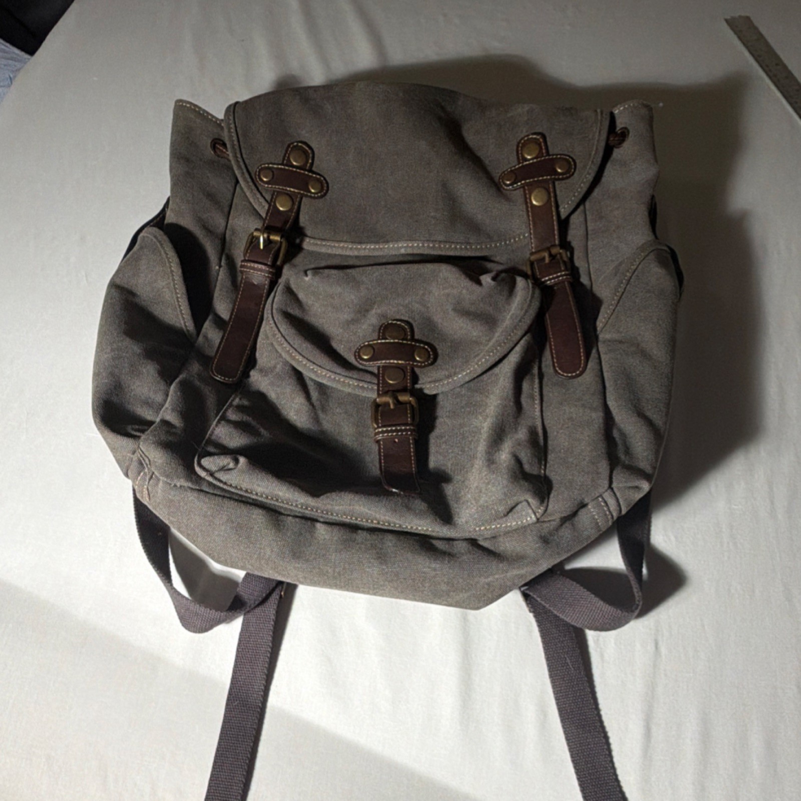 Cargoli Brown Backpack Buckle Magnetic Closure Adjustable Strap Outer Pockets