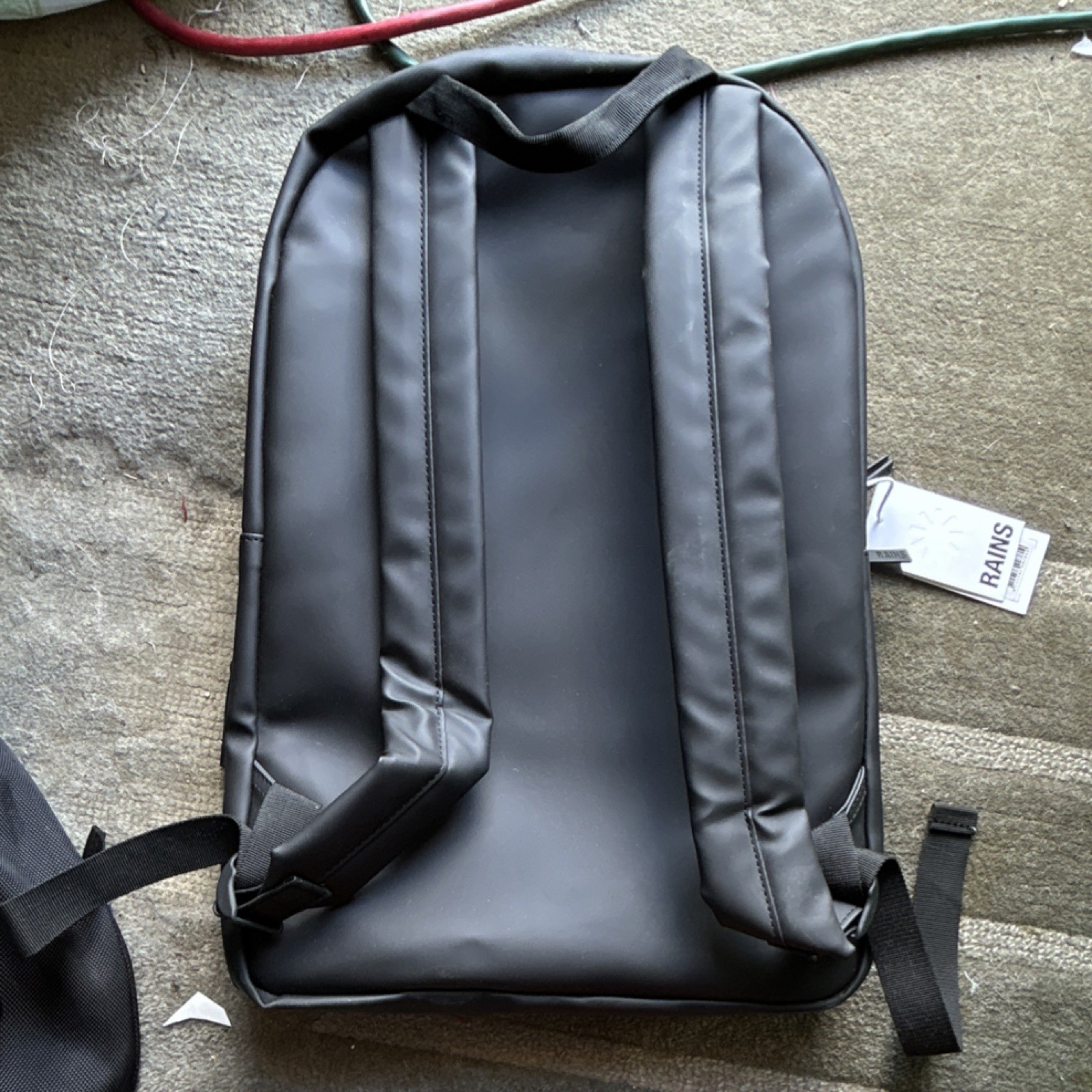 RAINS Black Polyurethane Backpack with Camel Patch Zip Closure for Men