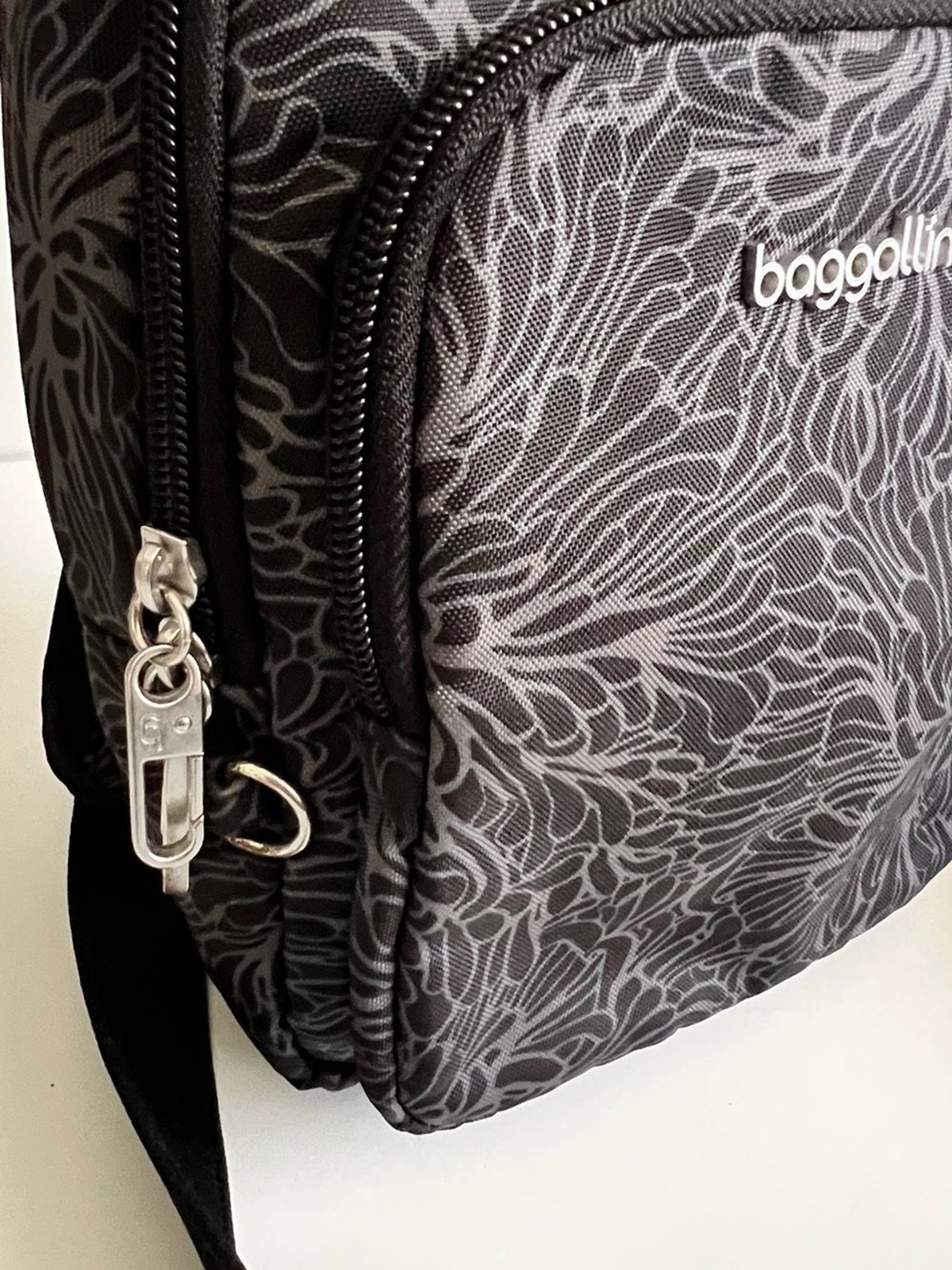 Baggallini Black and Gray Floral-Pattern Sling Bag