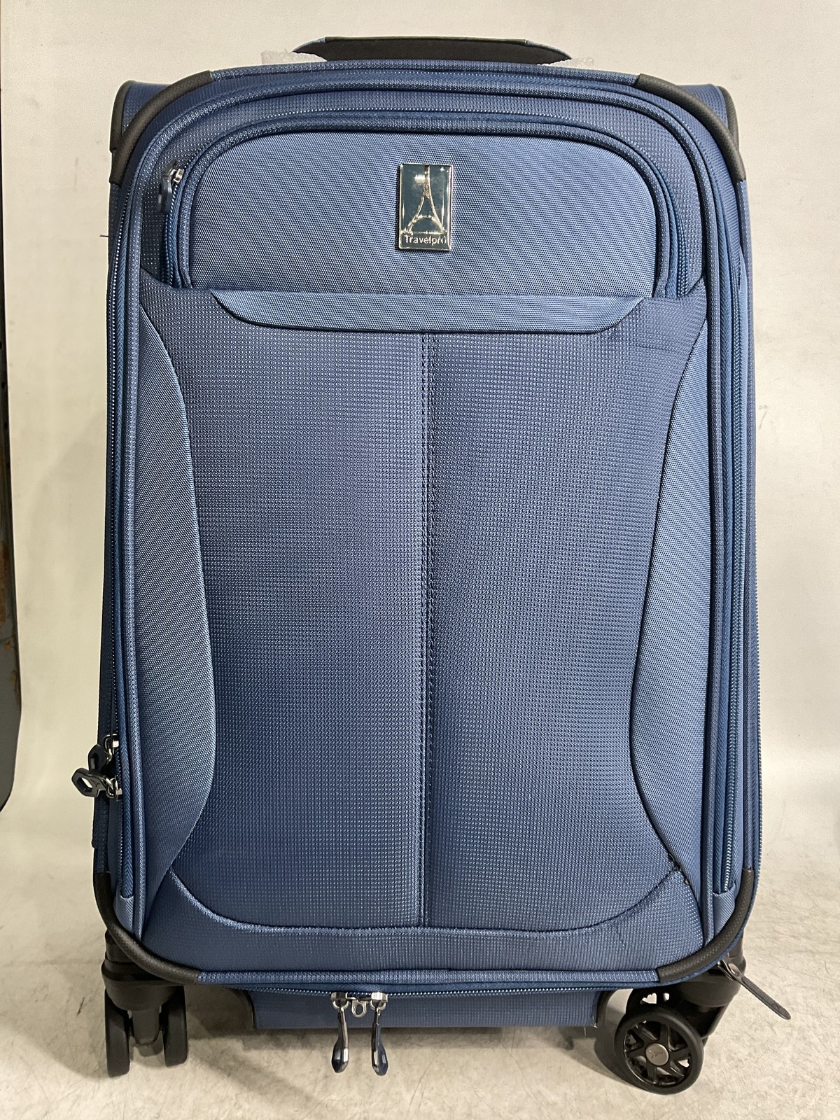 Travelpro Tourlite Softside Expandable Luggage with 4 Spinner Wheels, 21 In U45