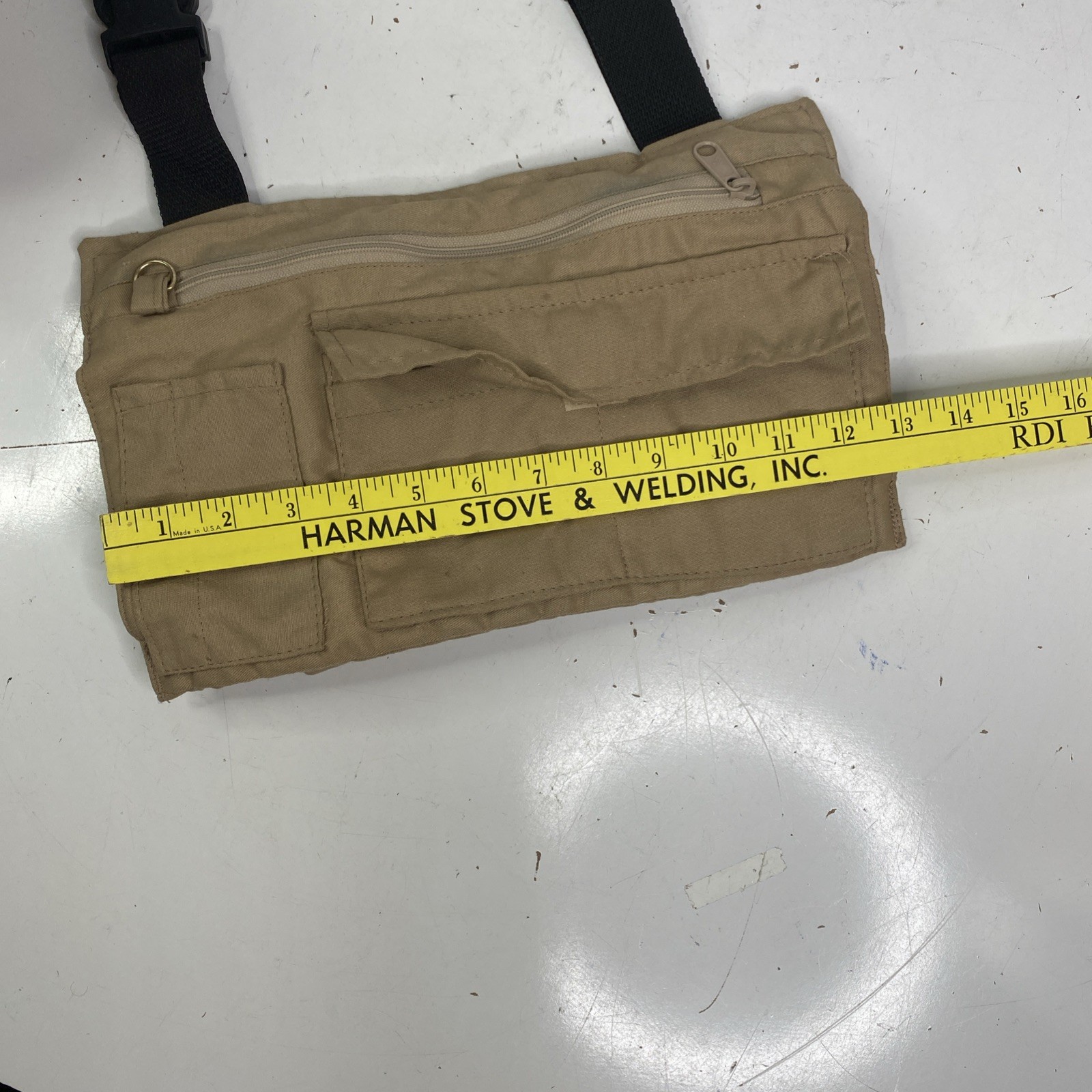 Orvis hanging accessory bag with plastic buckles insulated hand warmer pockets