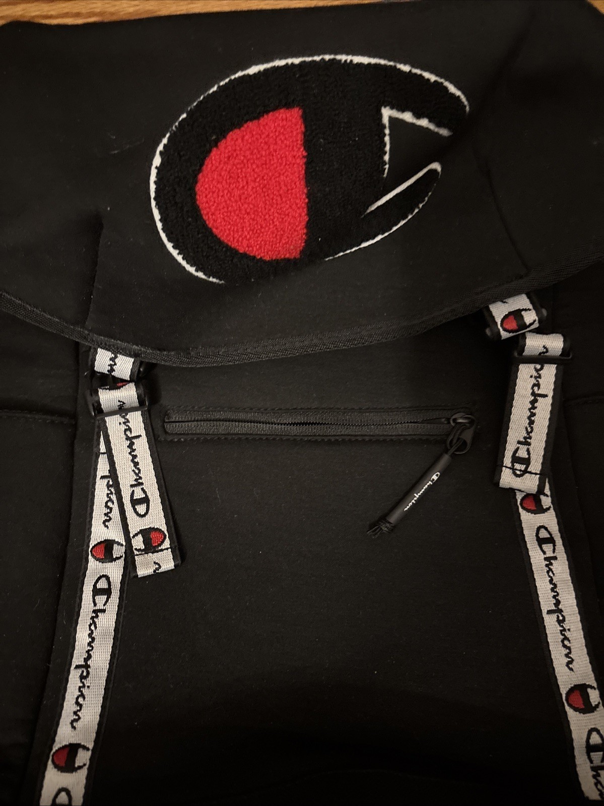 Champion Black Backpack Drawstring Buckle Adjustable Strap Front Pocket